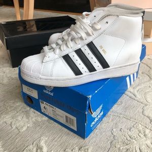 GLAM!!! Good condition original high top Adidas!